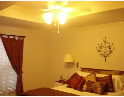 a view of painting on the wall and a window