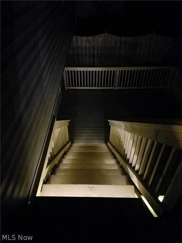 5472 Manning Circle North Ridgeville, OH 44039 - Photo 32 of 35 View down the deck stairs from top level