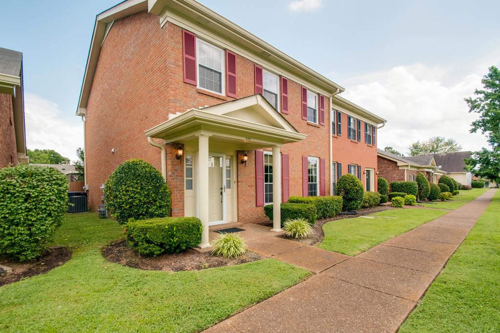 520 General George Patton Road Nashville, TN 37221 - Photo 1 of 30 a front view of a house with a yard