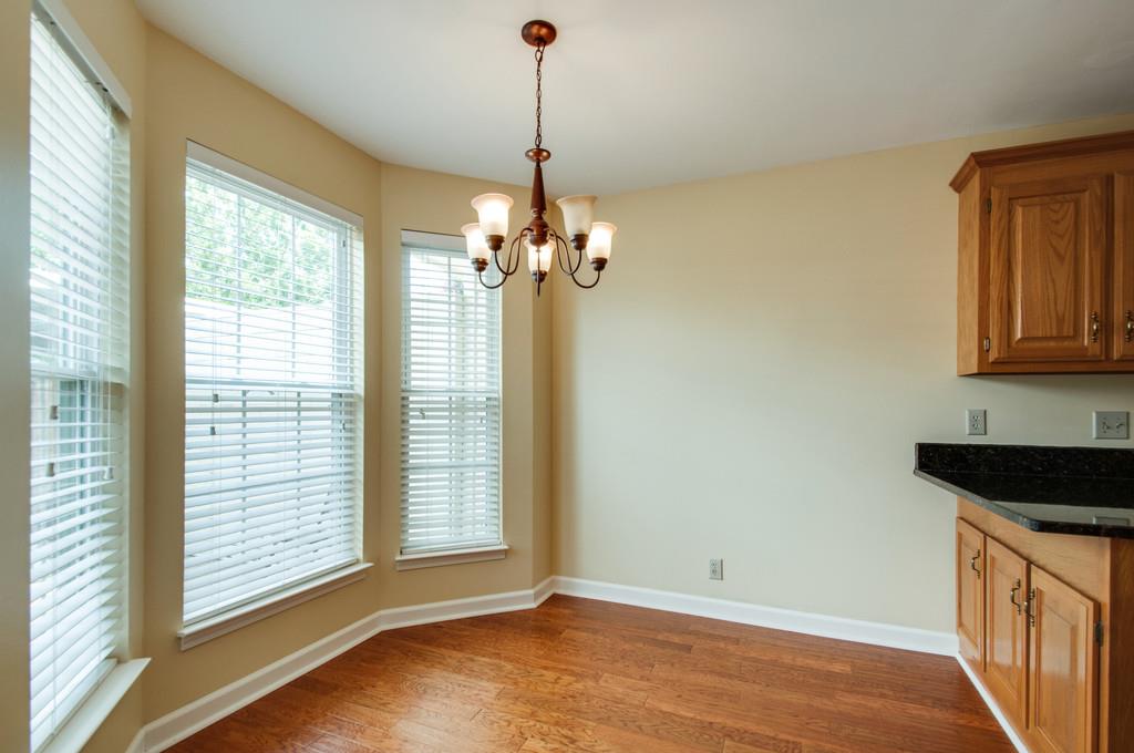 520 General George Patton Road Nashville, TN 37221 - Photo 13 of 30 a view of a kitchen with a dishwasher cabinets and a large window