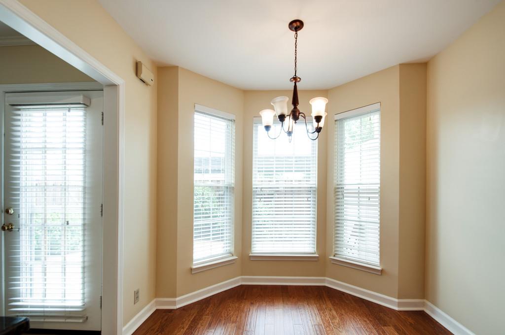 520 General George Patton Road Nashville, TN 37221 - Photo 14 of 30 a view of an empty room with wooden floor and a window