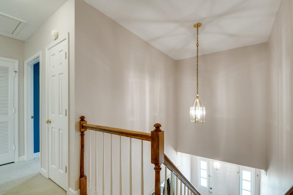 520 General George Patton Road Nashville, TN 37221 - Photo 18 of 30 a view of a hallway with a chandelier
