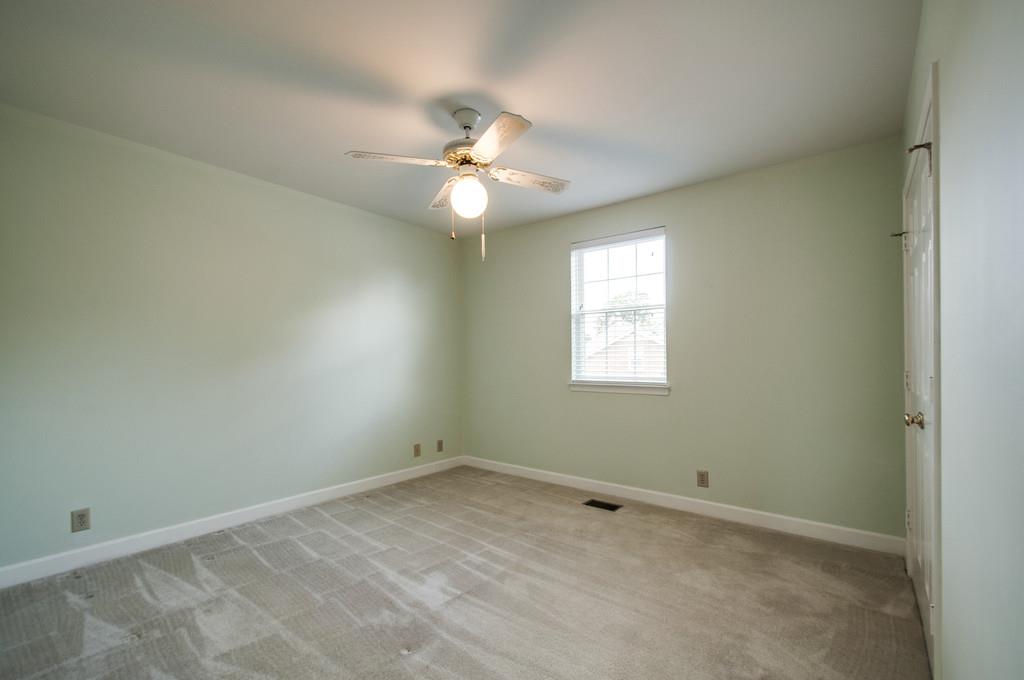 520 General George Patton Road Nashville, TN 37221 - Photo 24 of 30 an empty room with a window and ceiling fan