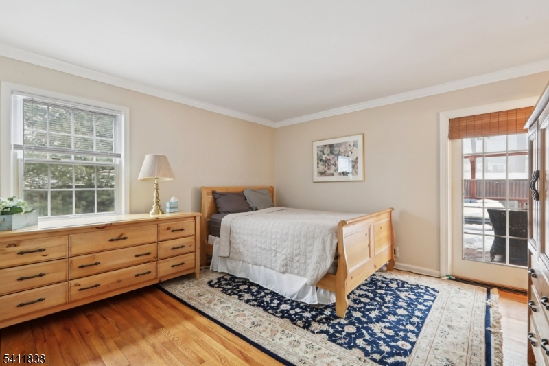 4 Southview Road Randolph, NJ 07869 - Photo 13 of 30 a bedroom with a bed and wooden floor