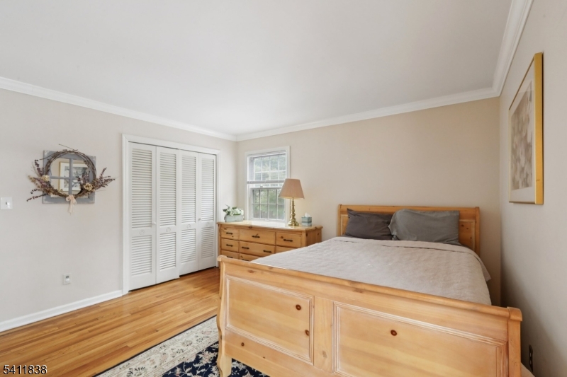 4 Southview Road Randolph, NJ 07869 - Photo 14 of 30 a bedroom with a bed and cabinets