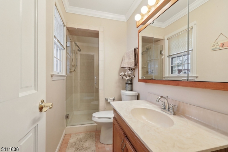 4 Southview Road Randolph, NJ 07869 - Photo 15 of 30 a bathroom with a granite countertop sink toilet and shower