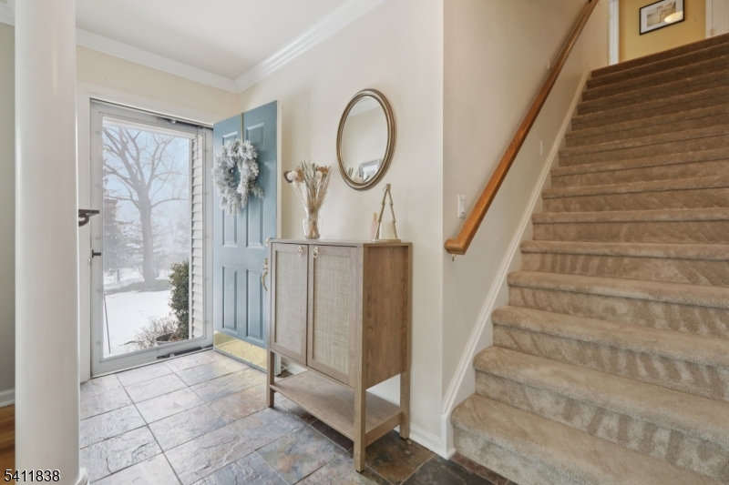 4 Southview Road Randolph, NJ 07869 - Photo 2 of 30 a view of entryway with wooden floor and mirror