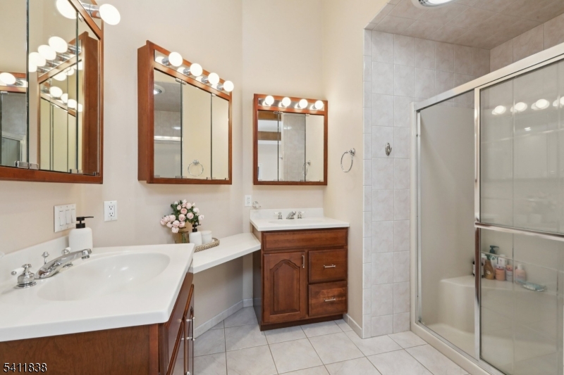 4 Southview Road Randolph, NJ 07869 - Photo 23 of 30 a bathroom with a sink and a mirror