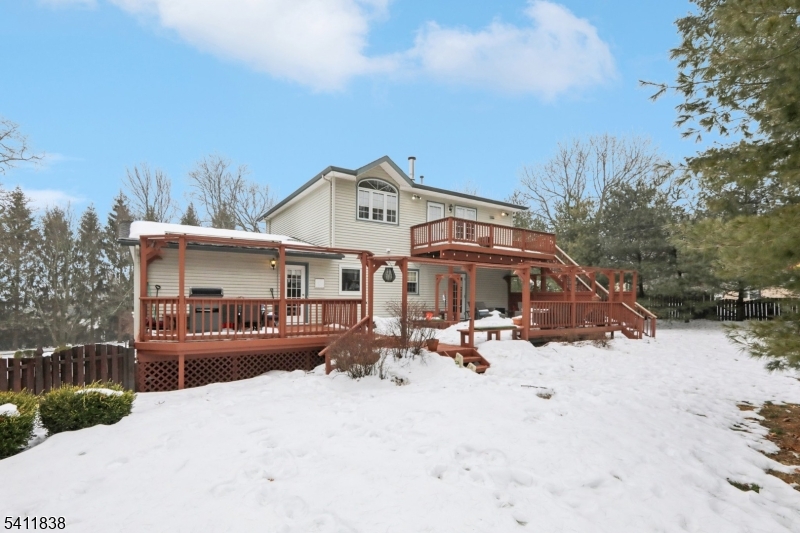 4 Southview Road Randolph, NJ 07869 - Photo 30 of 30 a front view of a house with a yard covered with snow