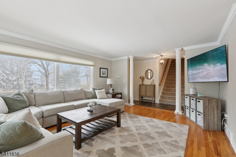 4 Southview Road Randolph, NJ 07869 - Photo 4 of 30 a living room with furniture a rug and a floor to ceiling window