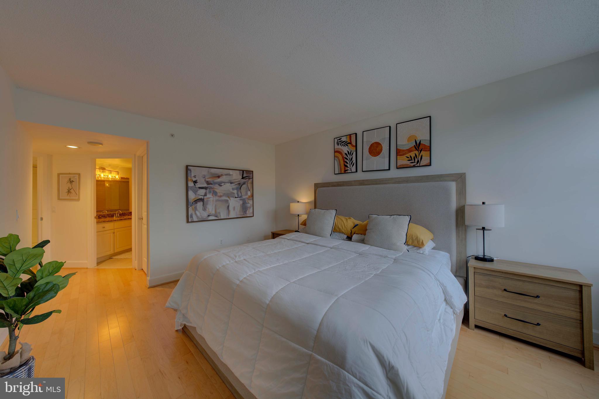 11800 Sunset Hills Road, Unit 222 Reston, VA 20190 - Photo 34 of 70 a bedroom with a bed and a dresser