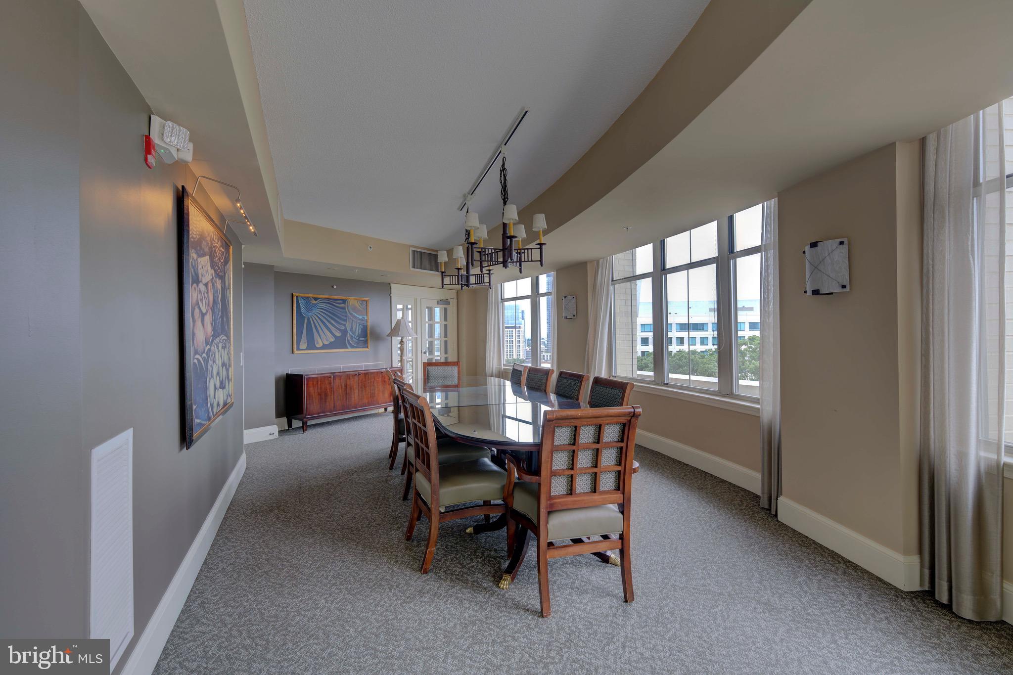 11800 Sunset Hills Road, Unit 222 Reston, VA 20190 - Photo 44 of 70 a view of a dining room with furniture and window