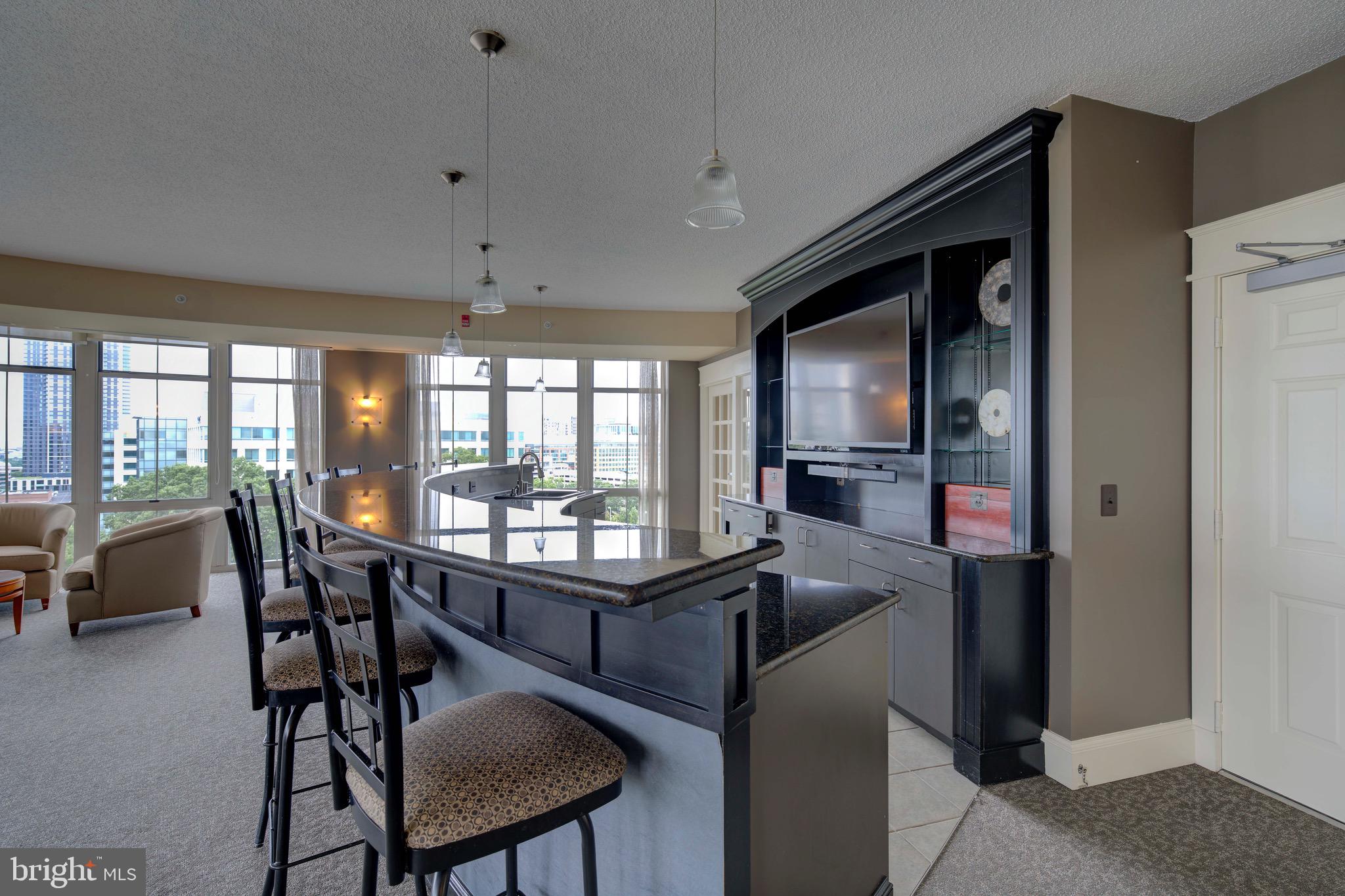 11800 Sunset Hills Road, Unit 222 Reston, VA 20190 - Photo 45 of 70 a view of a dining room with furniture window and outside view