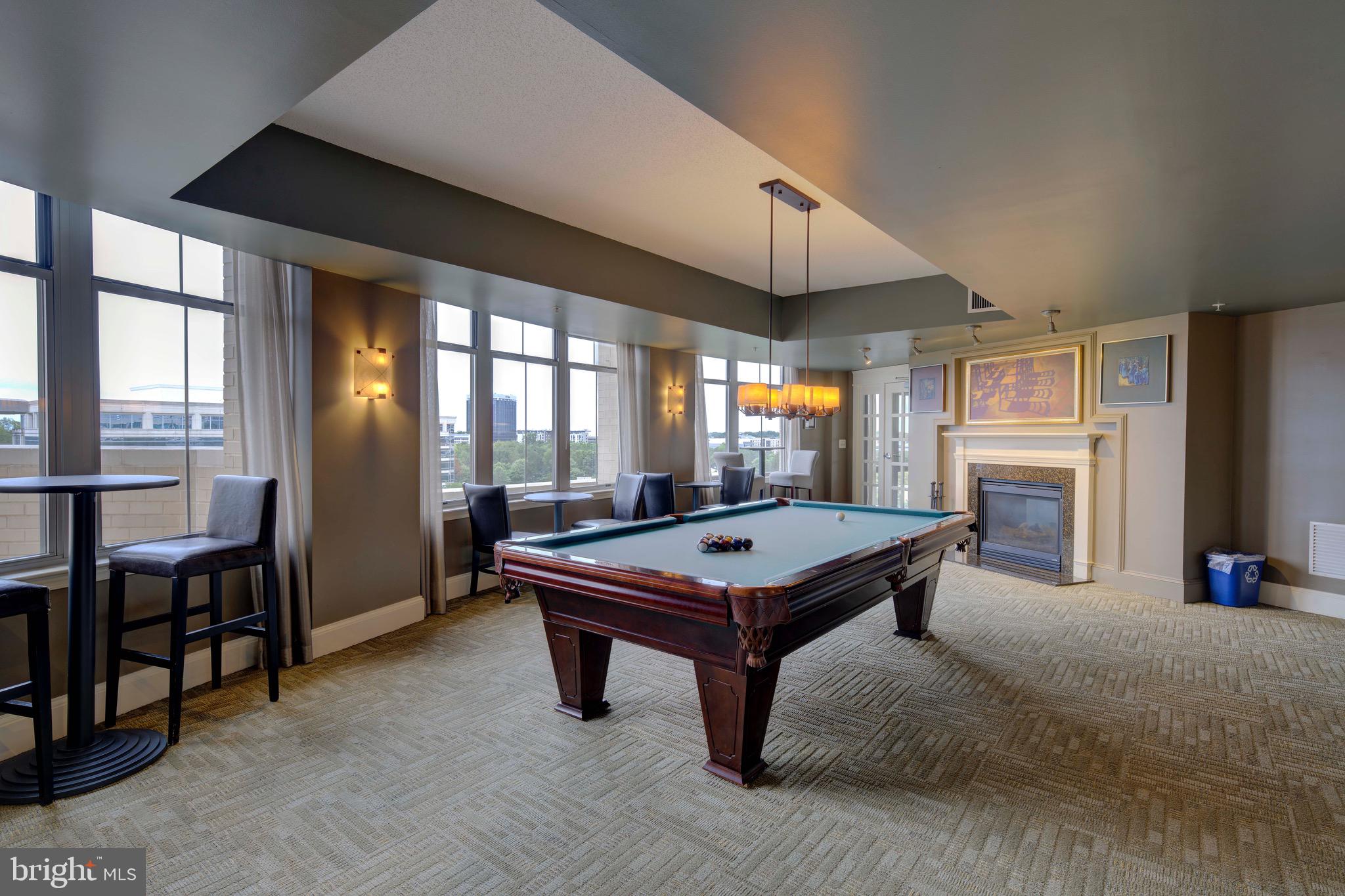11800 Sunset Hills Road, Unit 222 Reston, VA 20190 - Photo 48 of 70 a room with pool table and windows