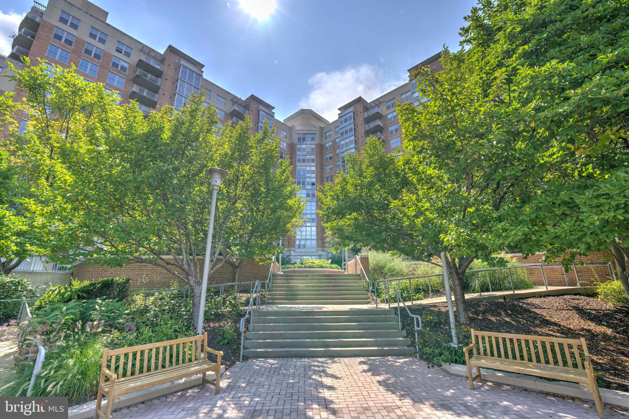 11800 Sunset Hills Road, Unit 222 Reston, VA 20190 - Photo 61 of 70 a view of a fountain in the middle of a yard