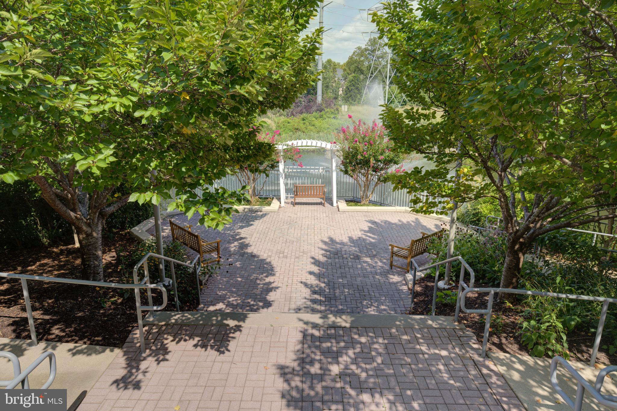 11800 Sunset Hills Road, Unit 222 Reston, VA 20190 - Photo 62 of 70 a view of a house with a yard