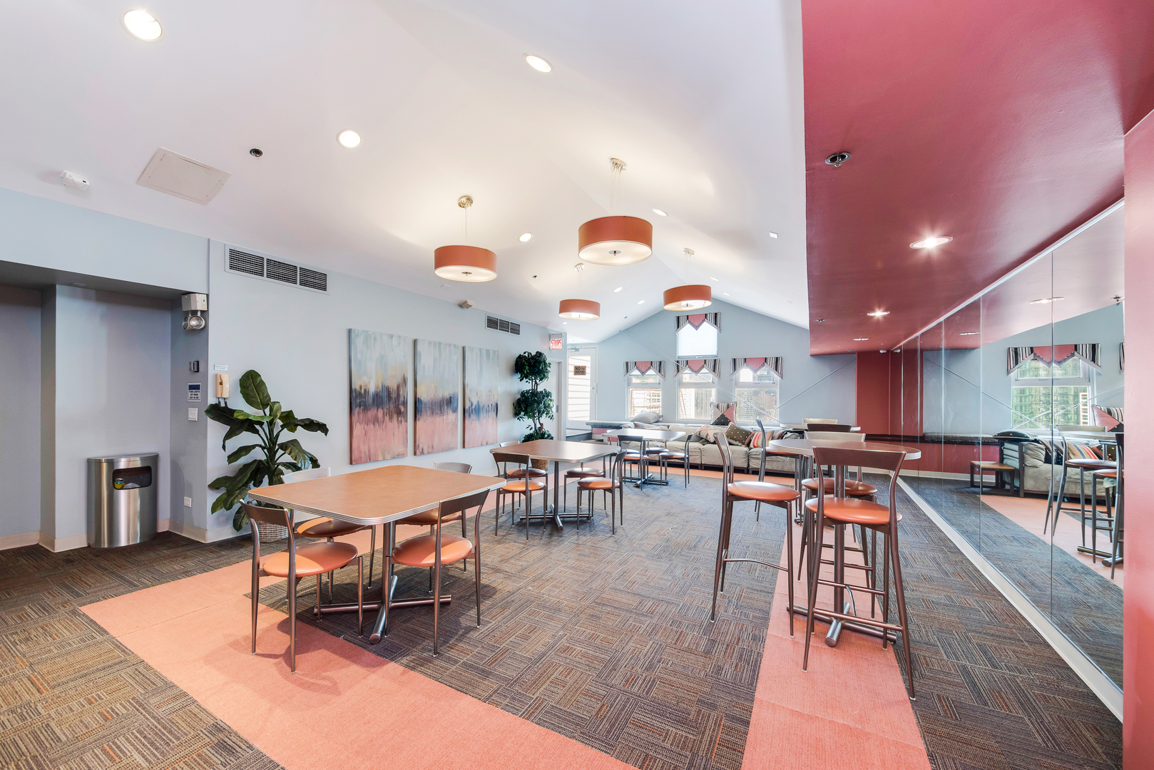 40 East 9th Street, Unit 715 Chicago, IL 60605 - Photo 16 of 19 a large kitchen with a table and chairs