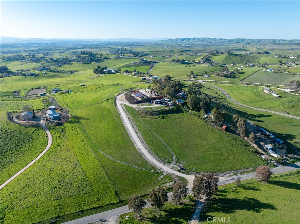 2245 Rancho Lomas Way San Miguel, CA 93451 - Photo 1 of 52 an aerial view of a golf course with chairs