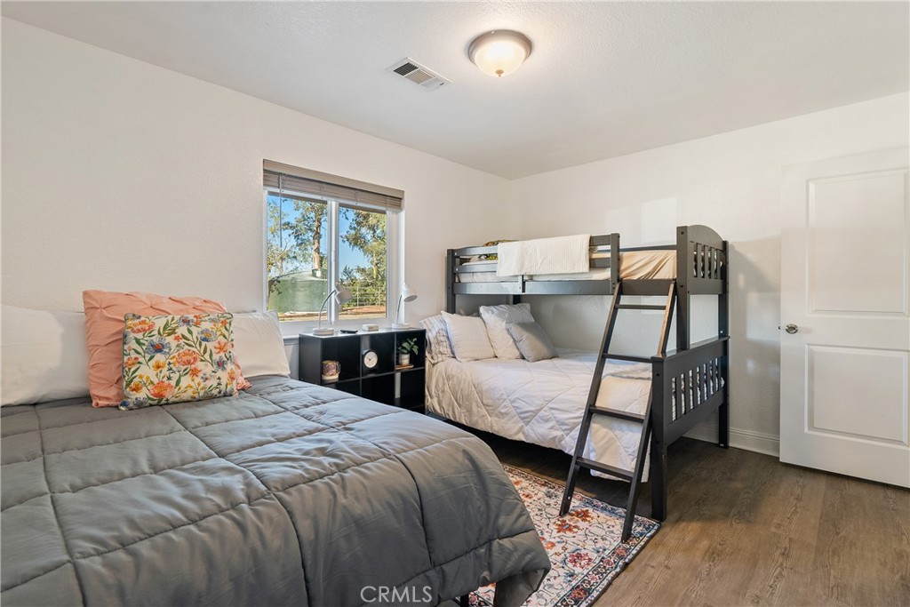 2245 Rancho Lomas Way San Miguel, CA 93451 - Photo 25 of 52 a bedroom with a bed and window
