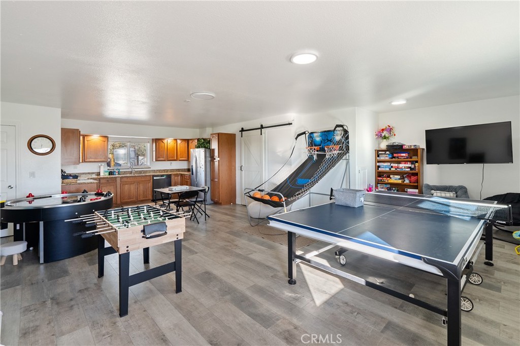 2245 Rancho Lomas Way San Miguel, CA 93451 - Photo 27 of 52 a living room with furniture and a flat screen tv