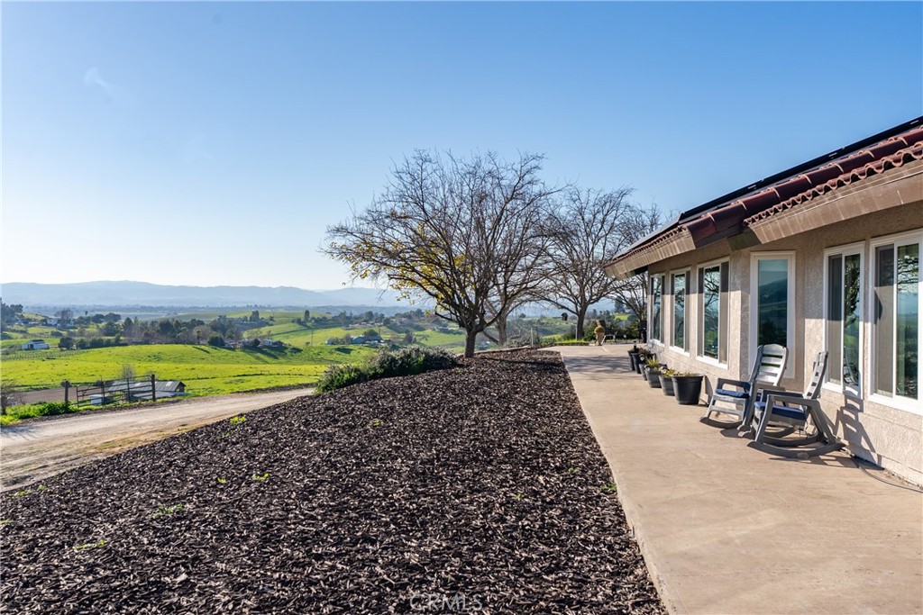 2245 Rancho Lomas Way San Miguel, CA 93451 - Photo 38 of 52 a view of a house with a swimming pool and sitting area