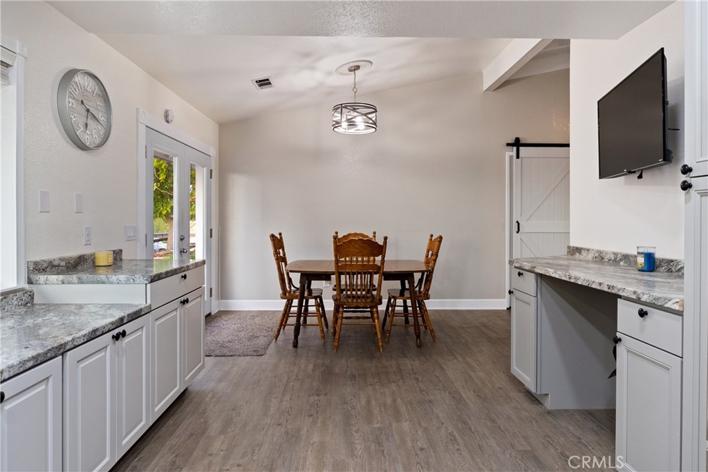 2245 Rancho Lomas Way San Miguel, CA 93451 - Photo 7 of 52 a view of a dining room with furniture window and wooden floor