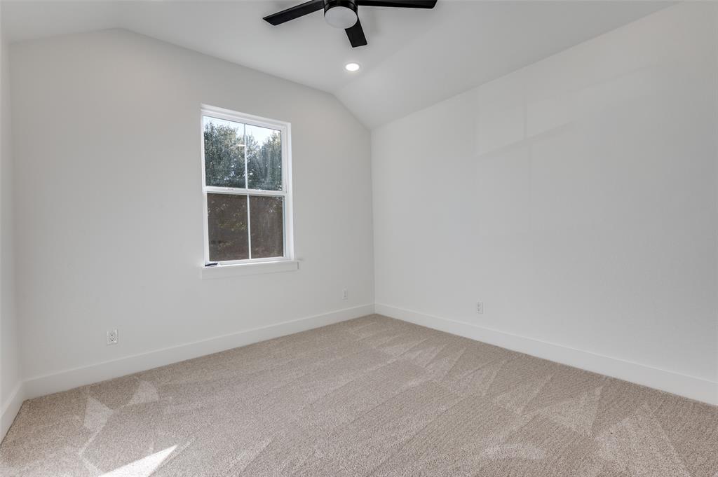 1013 Murphy Street Gainesville, TX 76240 - Photo 13 of 22 an empty room with a window