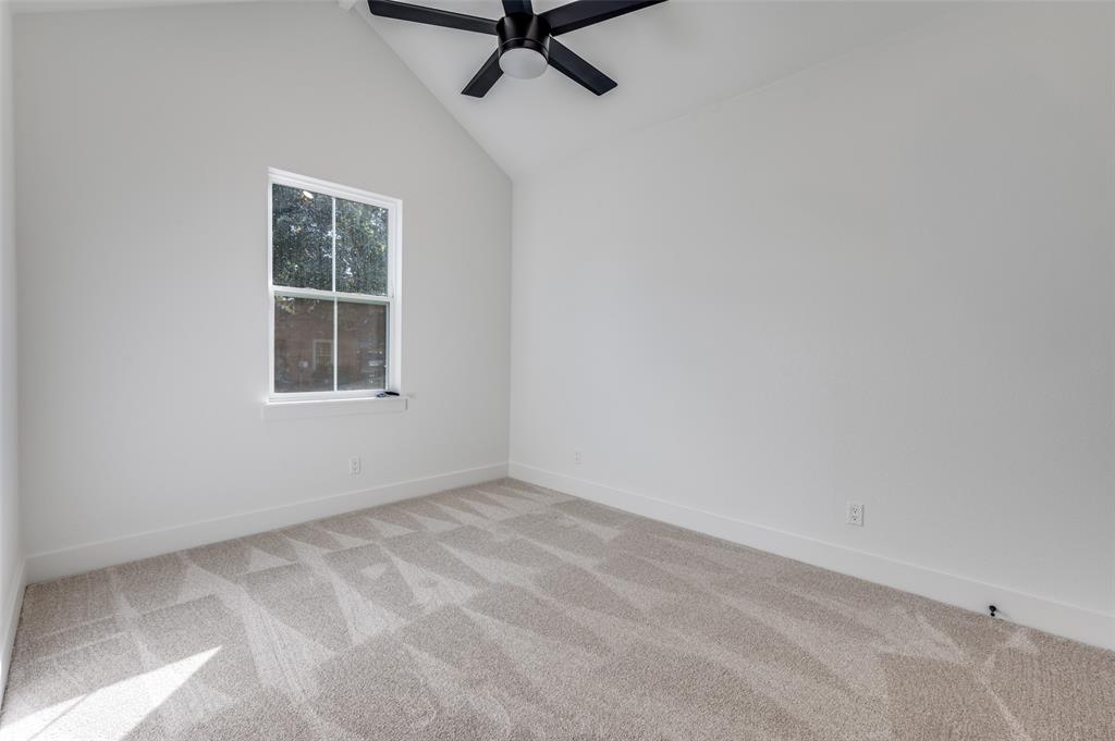 1013 Murphy Street Gainesville, TX 76240 - Photo 14 of 22 an empty room with windows