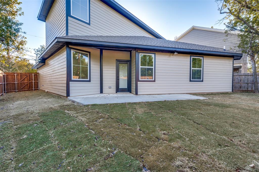 1013 Murphy Street Gainesville, TX 76240 - Photo 21 of 22 a view of a house with a yard
