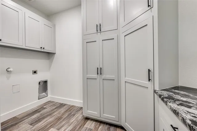 a view of cabinets and wooden floor