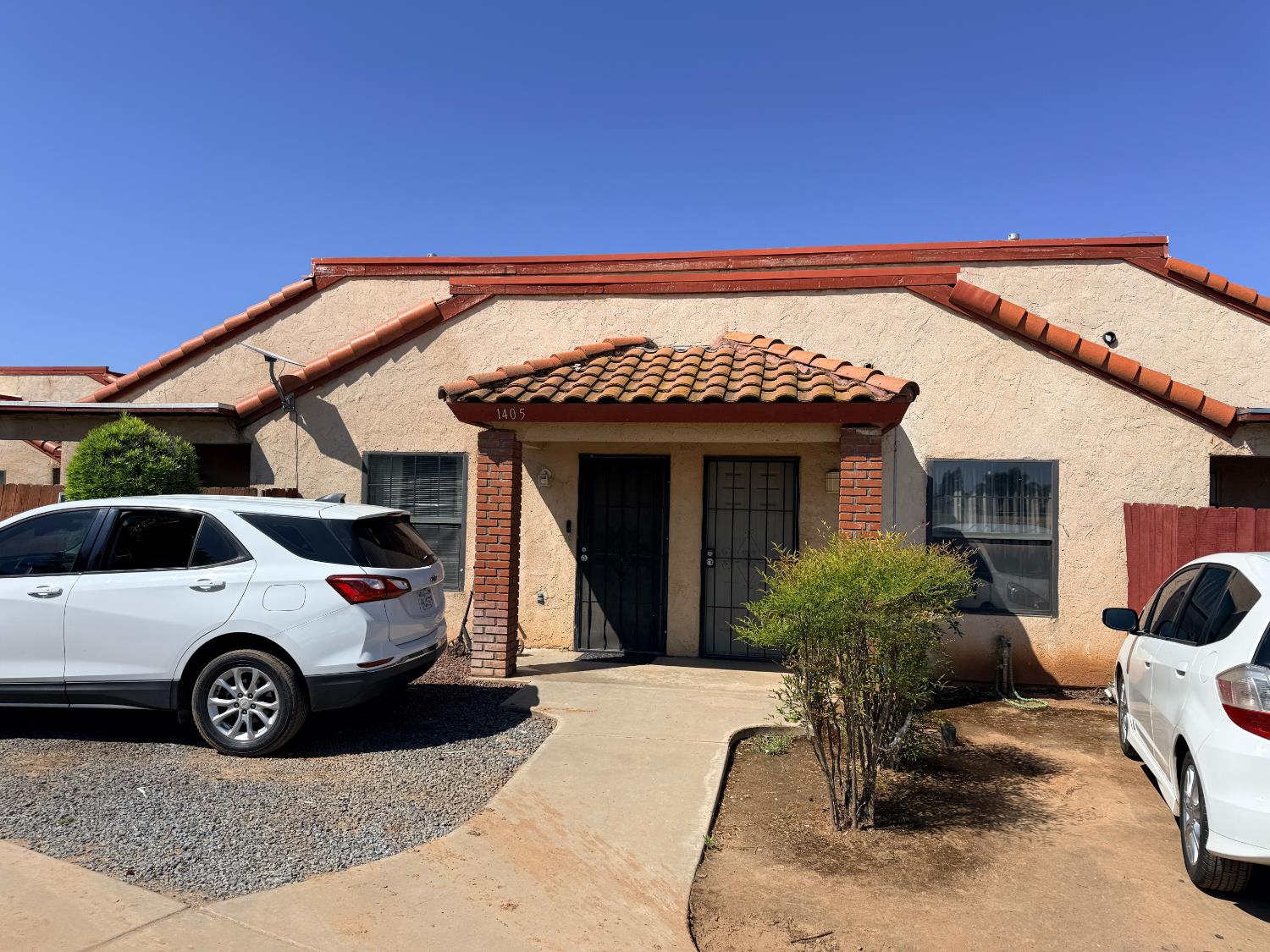 1405 East Cypress Avenue Reedley, CA 93654 - Photo 3 of 29 a view of a house with a outdoor space