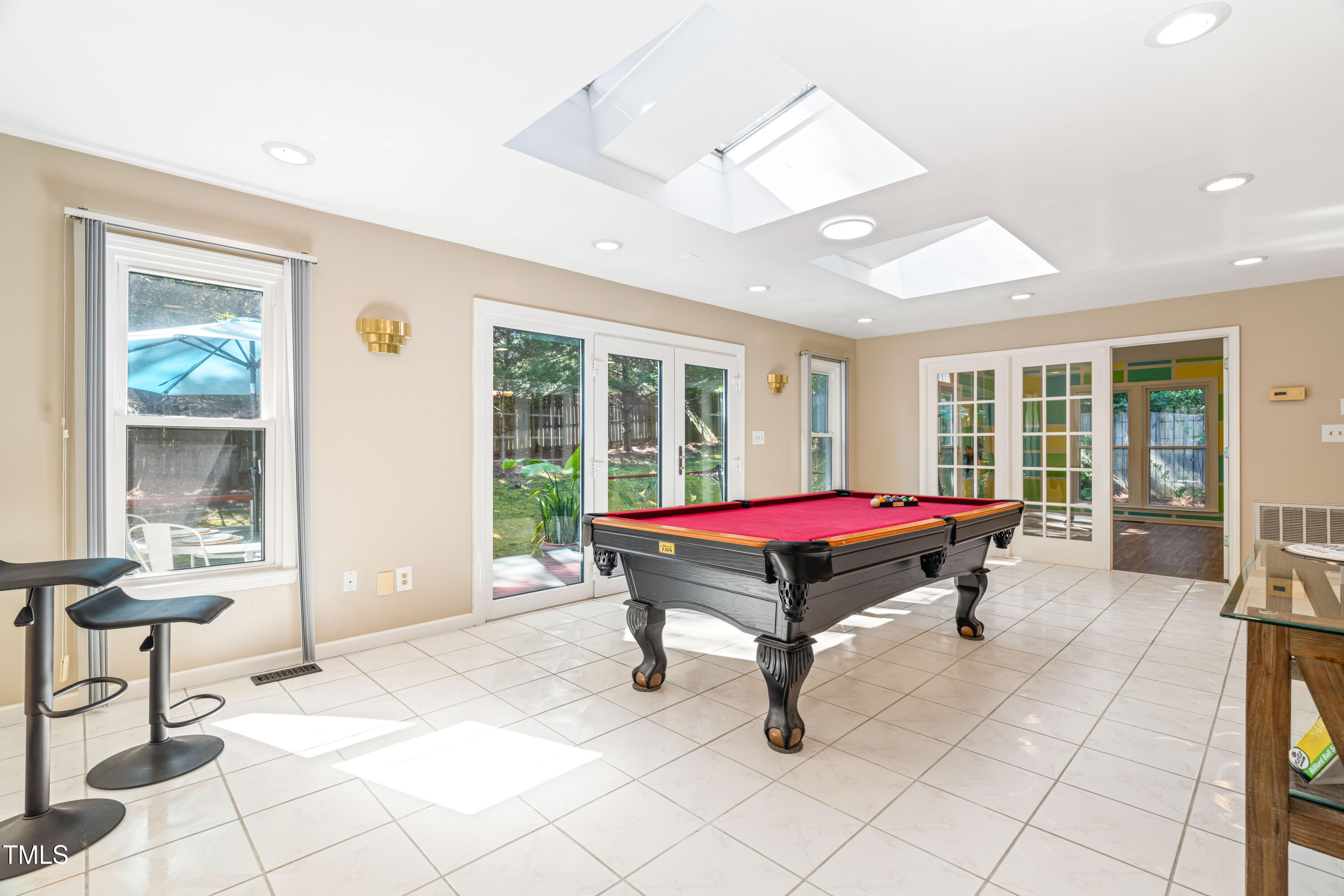 1106 Wellstone Circle Apex, NC 27502 - Photo 20 of 67 a room with pool table and windows