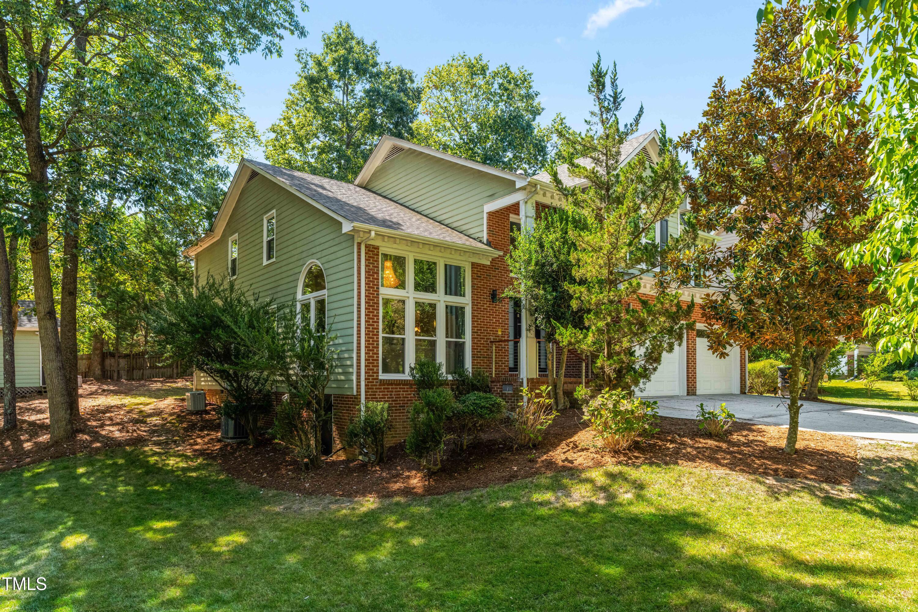 1106 Wellstone Circle Apex, NC 27502 - Photo 2 of 67 a view of a house with a yard