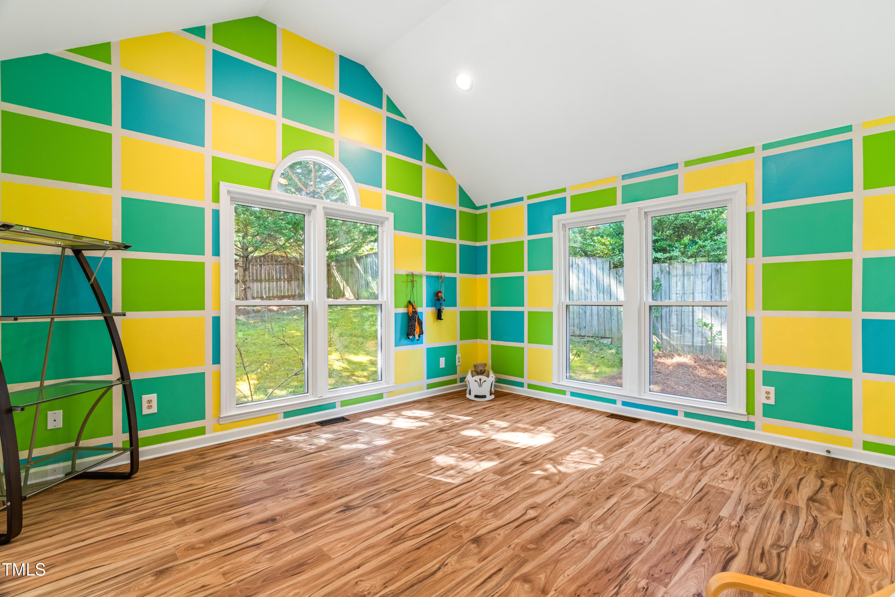 1106 Wellstone Circle Apex, NC 27502 - Photo 21 of 67 a view of a living room and a wooden floor