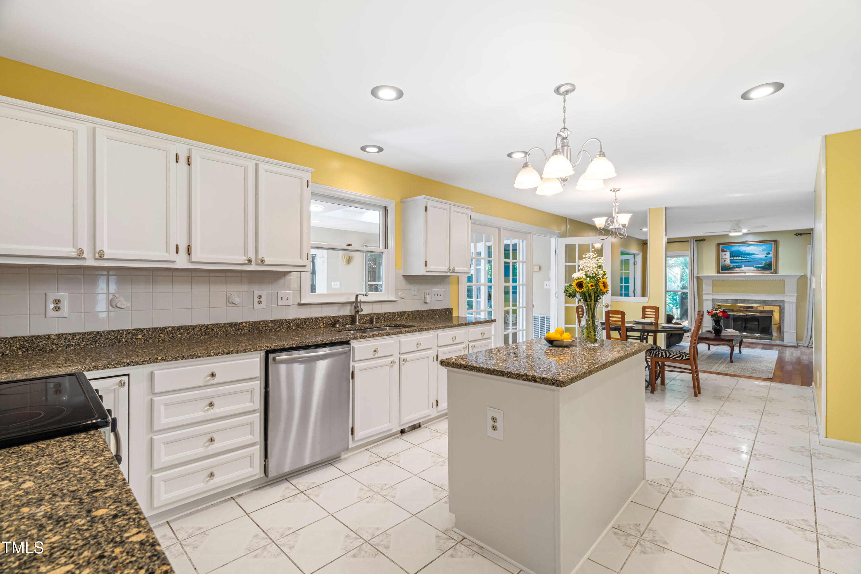 1106 Wellstone Circle Apex, NC 27502 - Photo 30 of 67 a kitchen with cabinets and chairs