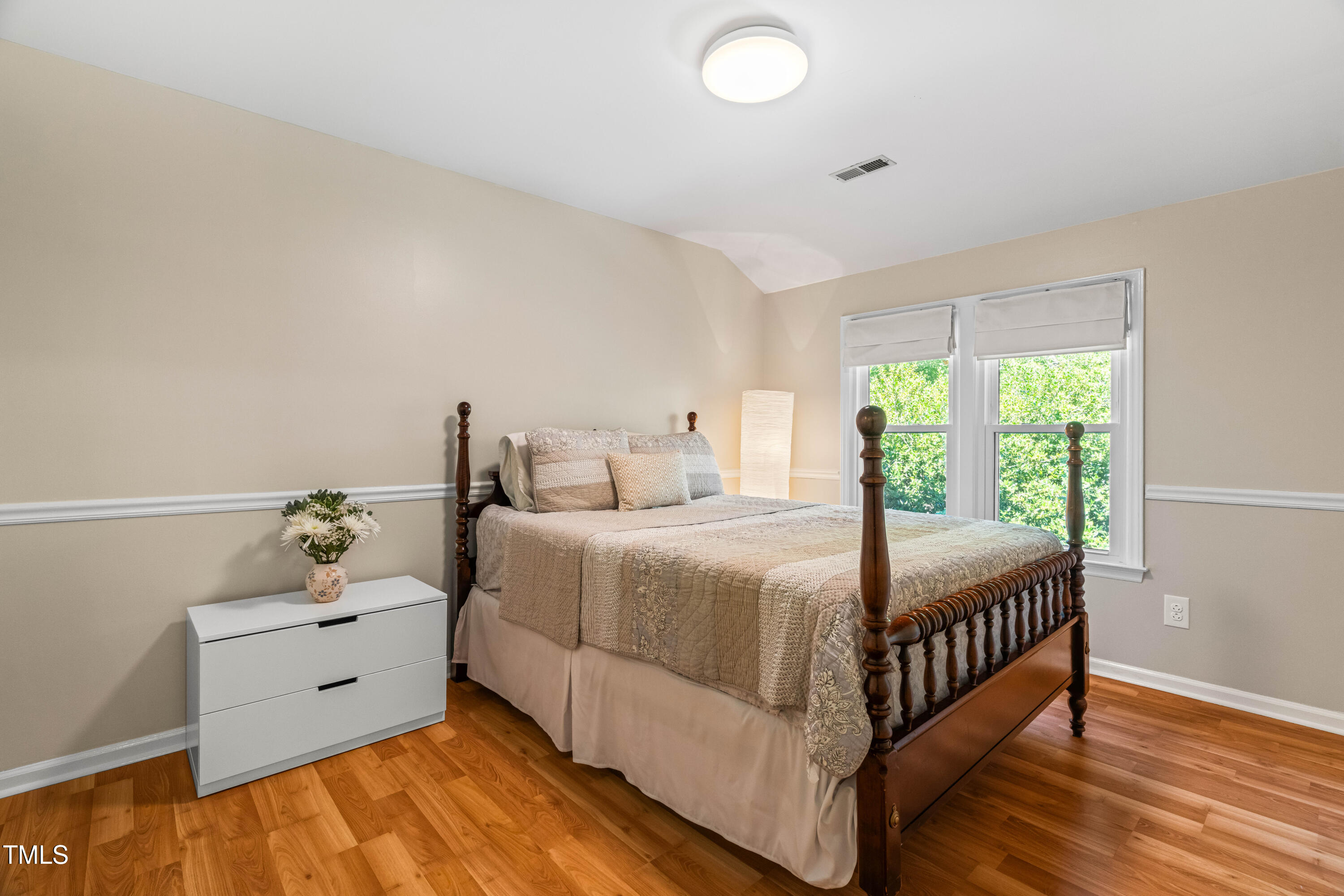 1106 Wellstone Circle Apex, NC 27502 - Photo 47 of 67 a bedroom with a bed and window
