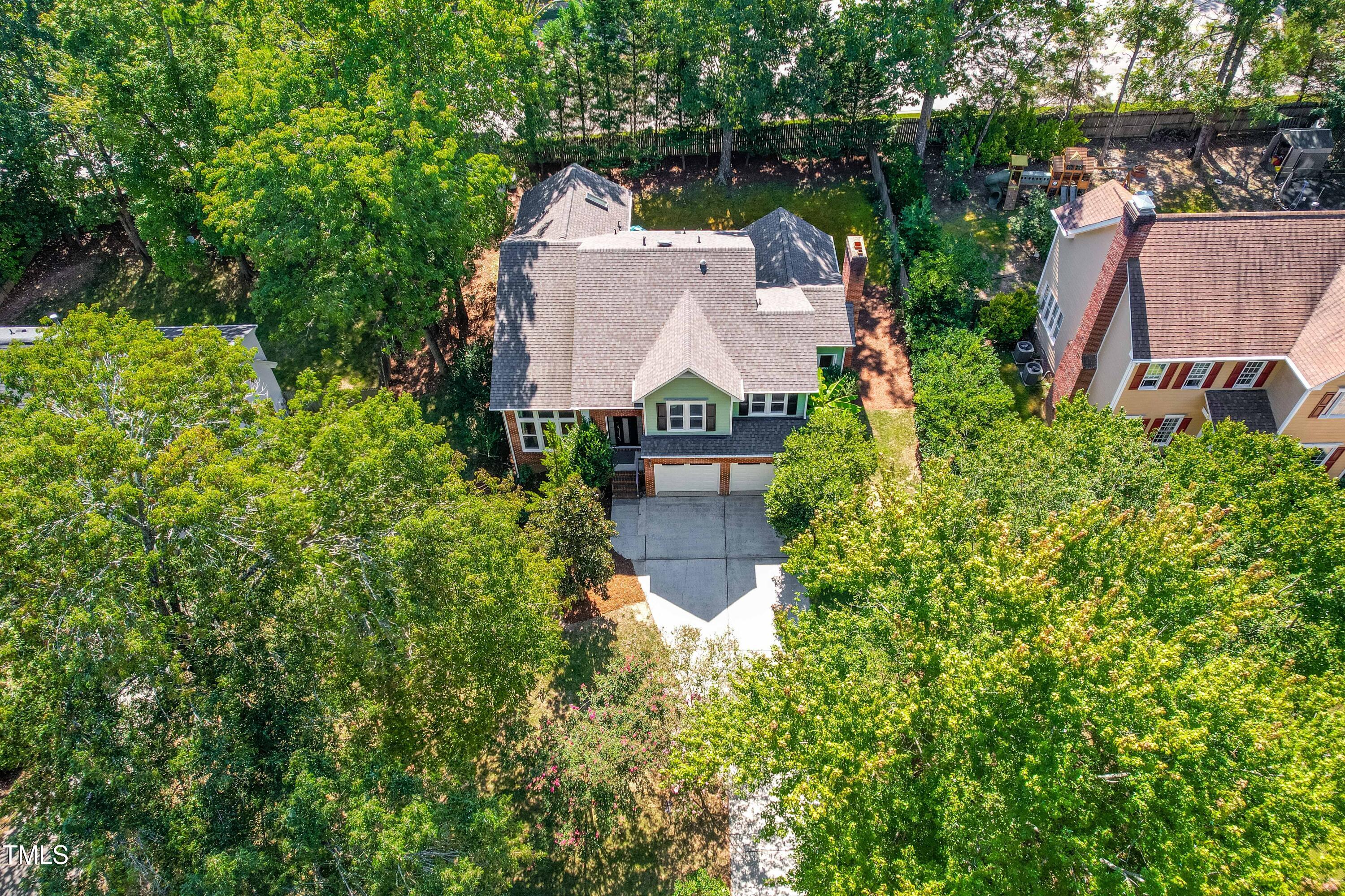 1106 Wellstone Circle Apex, NC 27502 - Photo 5 of 67 an aerial view of a house with garden space and a street view