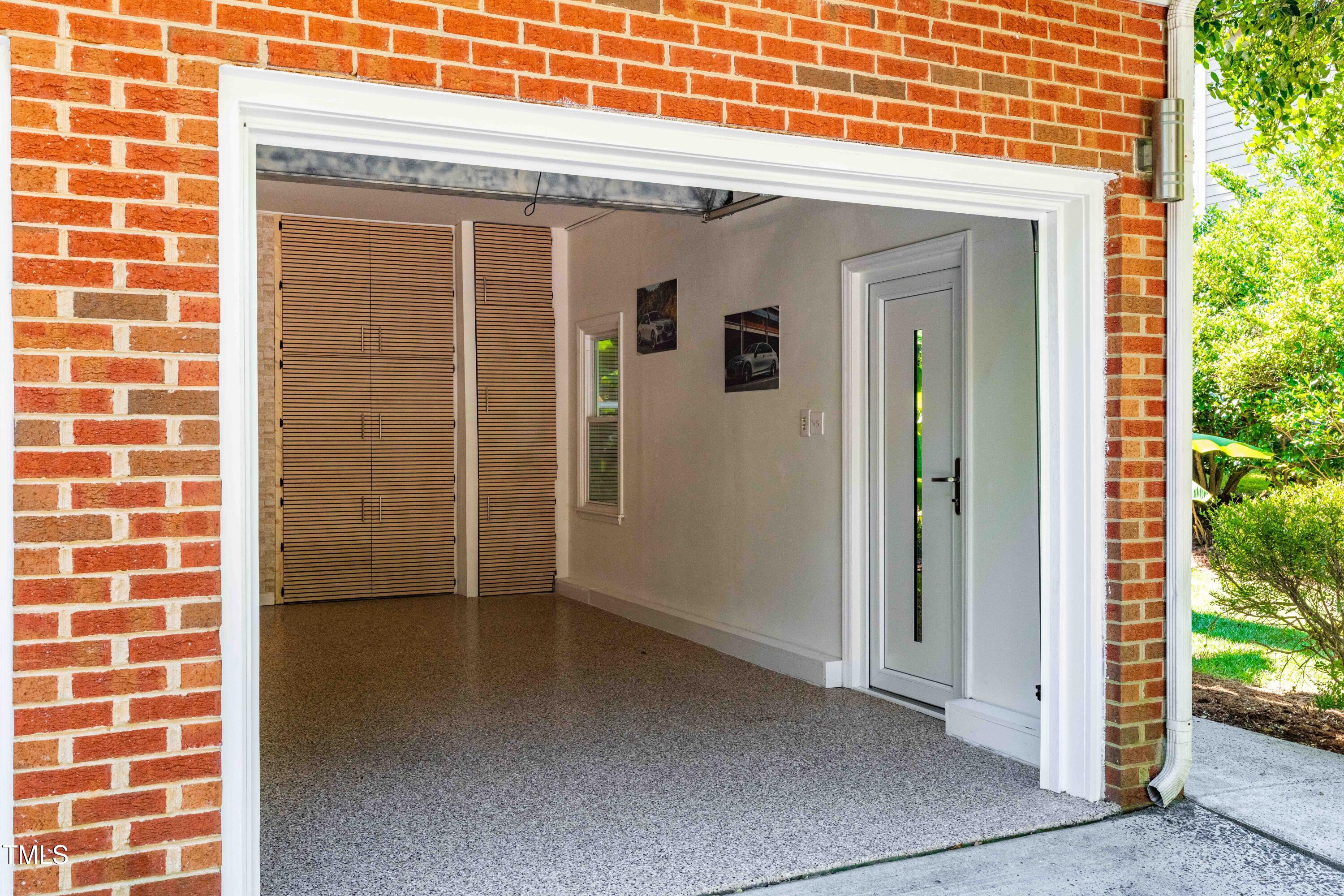 1106 Wellstone Circle Apex, NC 27502 - Photo 60 of 67 a view of a glass door with a window