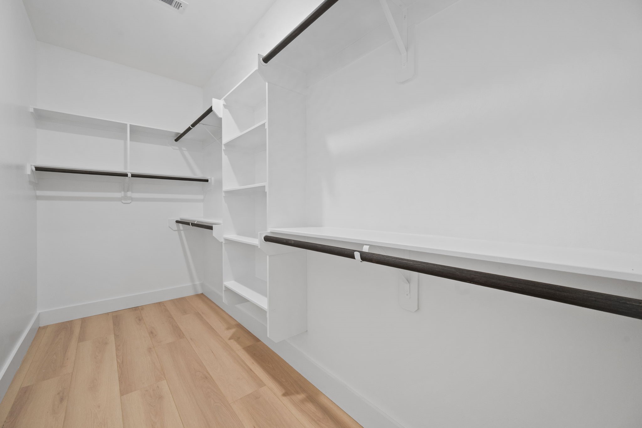 8410 Sunnyhill Street Houston, TX 77088 - Photo 11 of 20 a view of an empty walk in closet