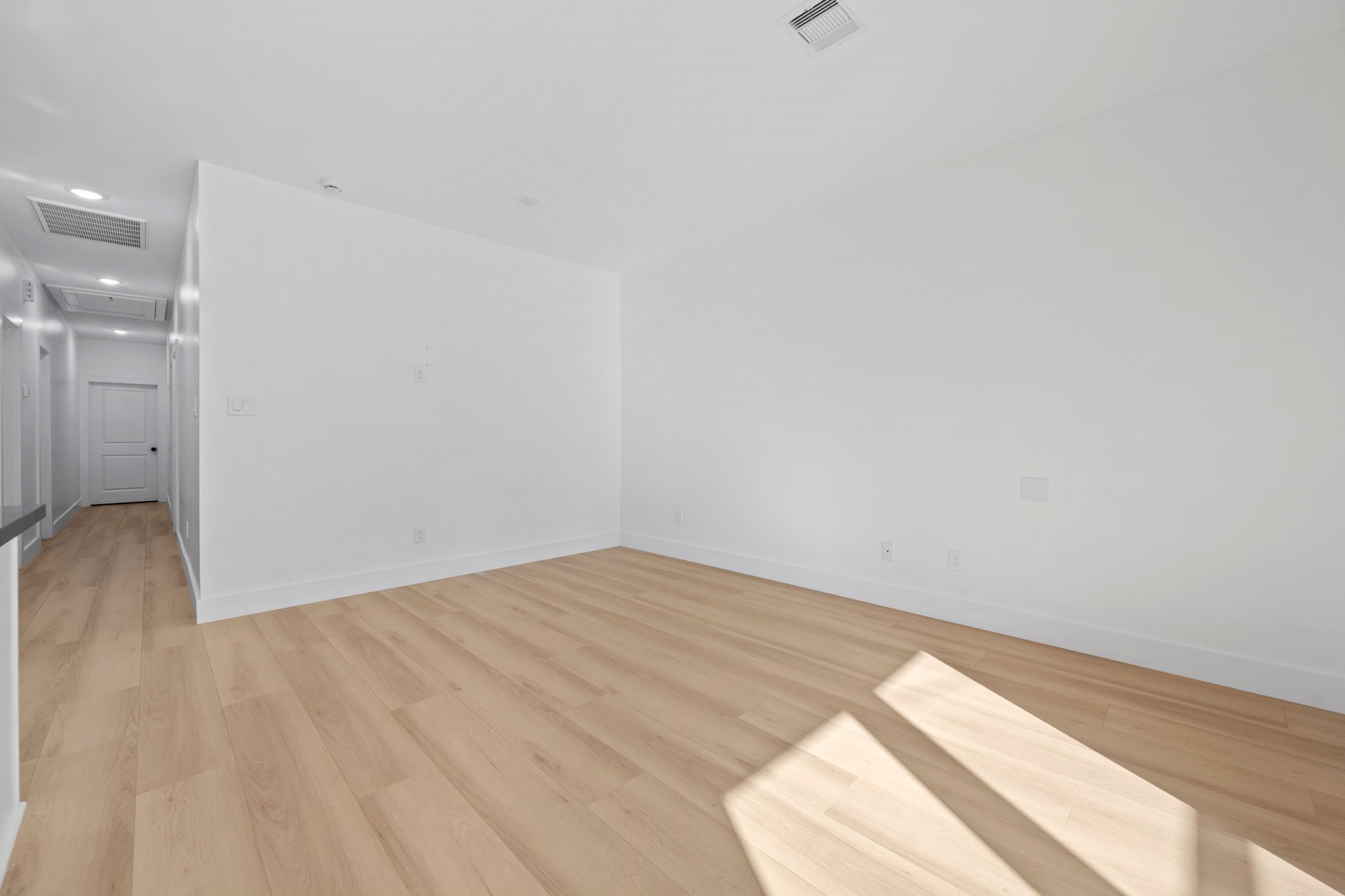 8410 Sunnyhill Street Houston, TX 77088 - Photo 16 of 20 a view of empty room with wooden floor and fan