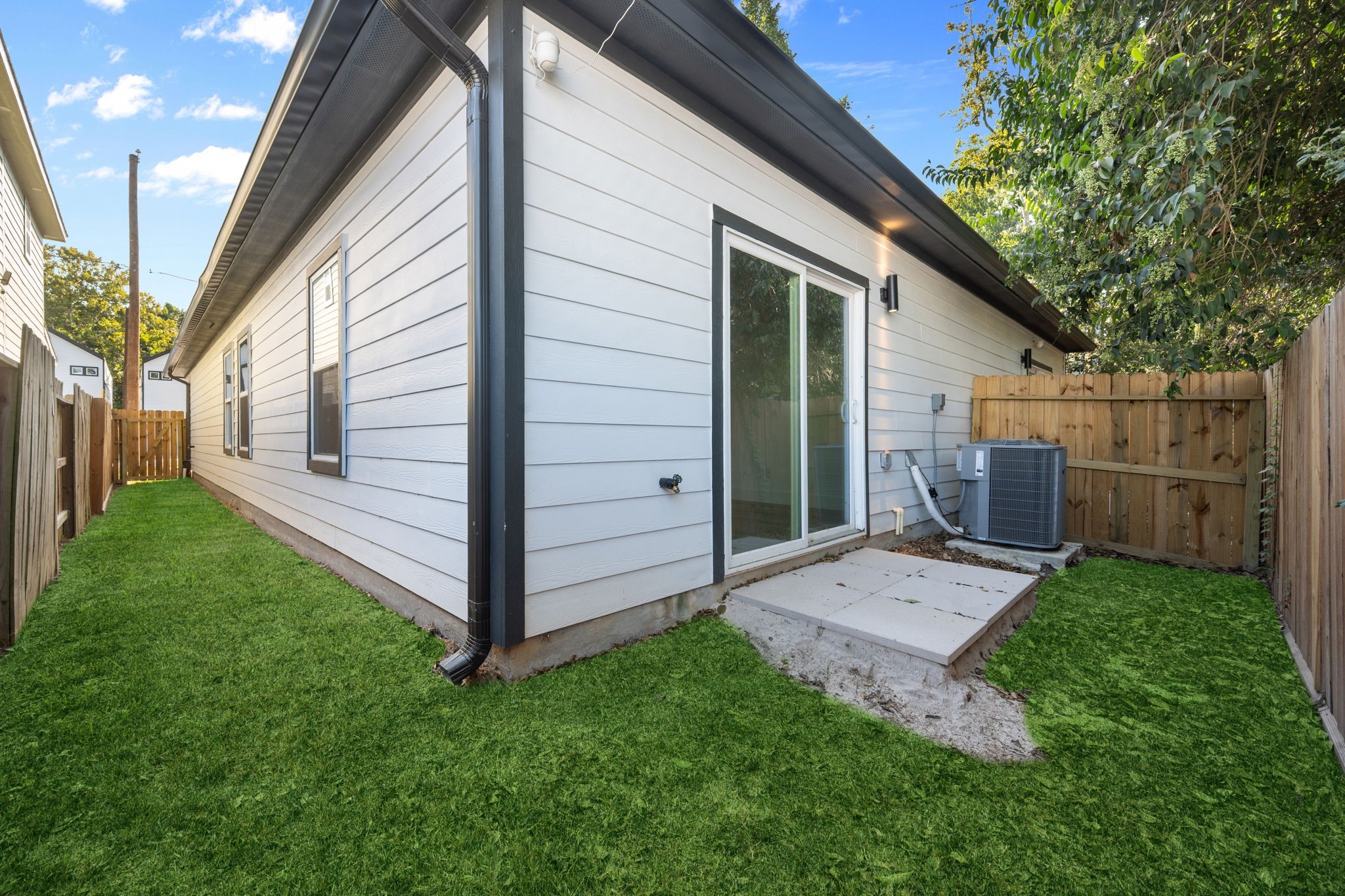 8410 Sunnyhill Street Houston, TX 77088 - Photo 9 of 20 a view of backyard with a garden
