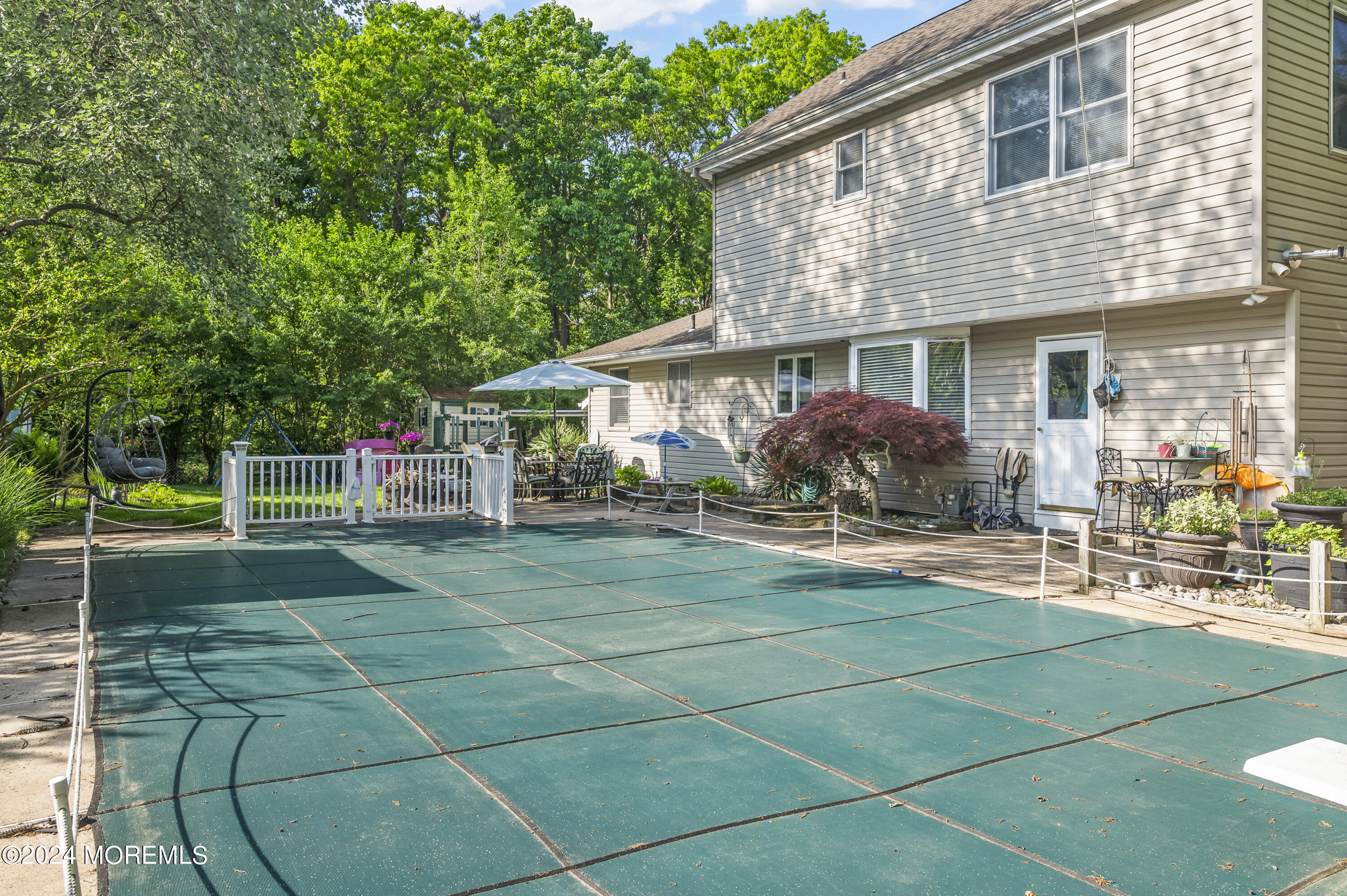 114 Andrew Lane Brick, NJ 08724 - Photo 16 of 54 a front view of a house with patio