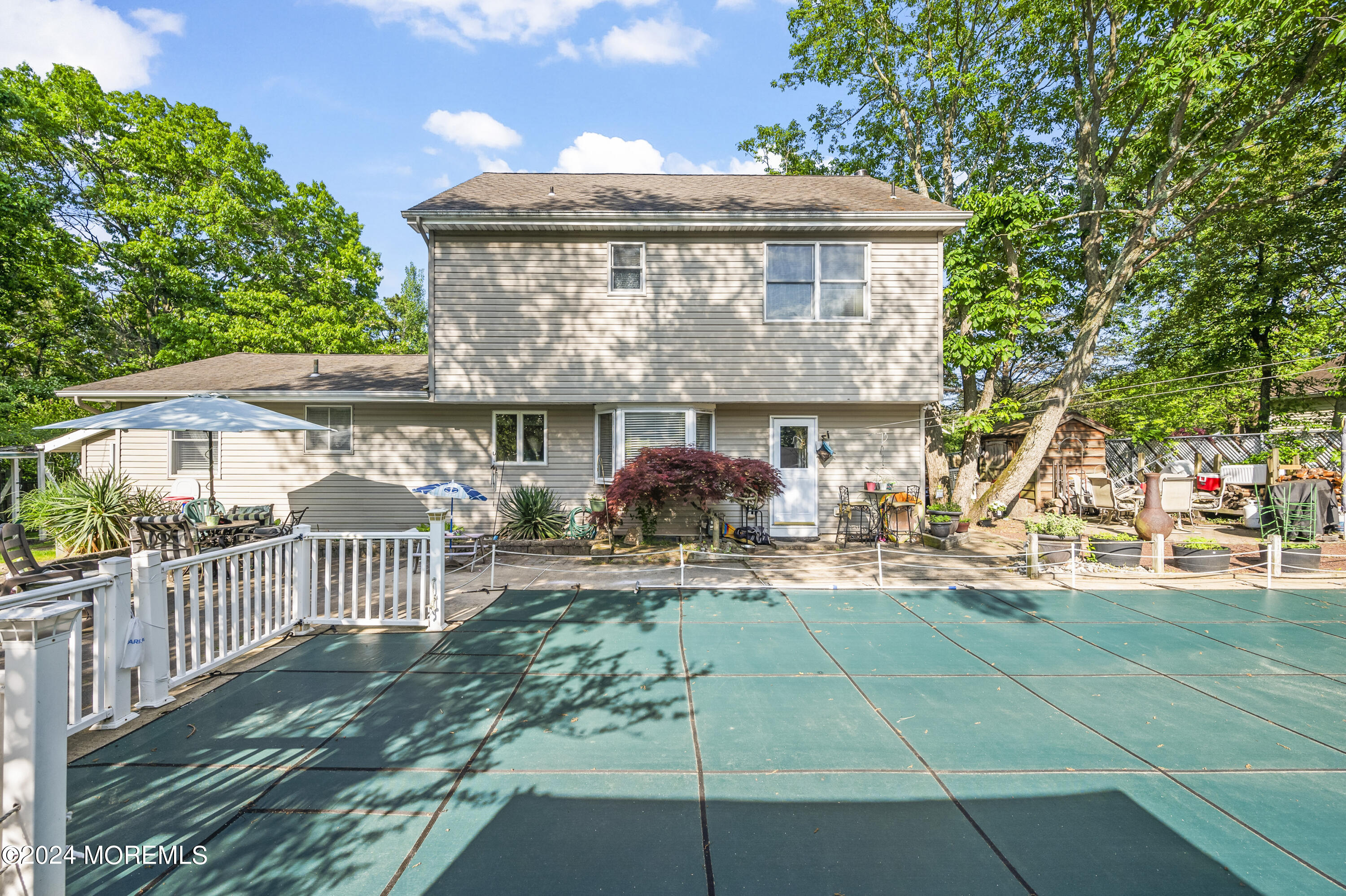 114 Andrew Lane Brick, NJ 08724 - Photo 22 of 54 a view of a house with backyard and sitting area