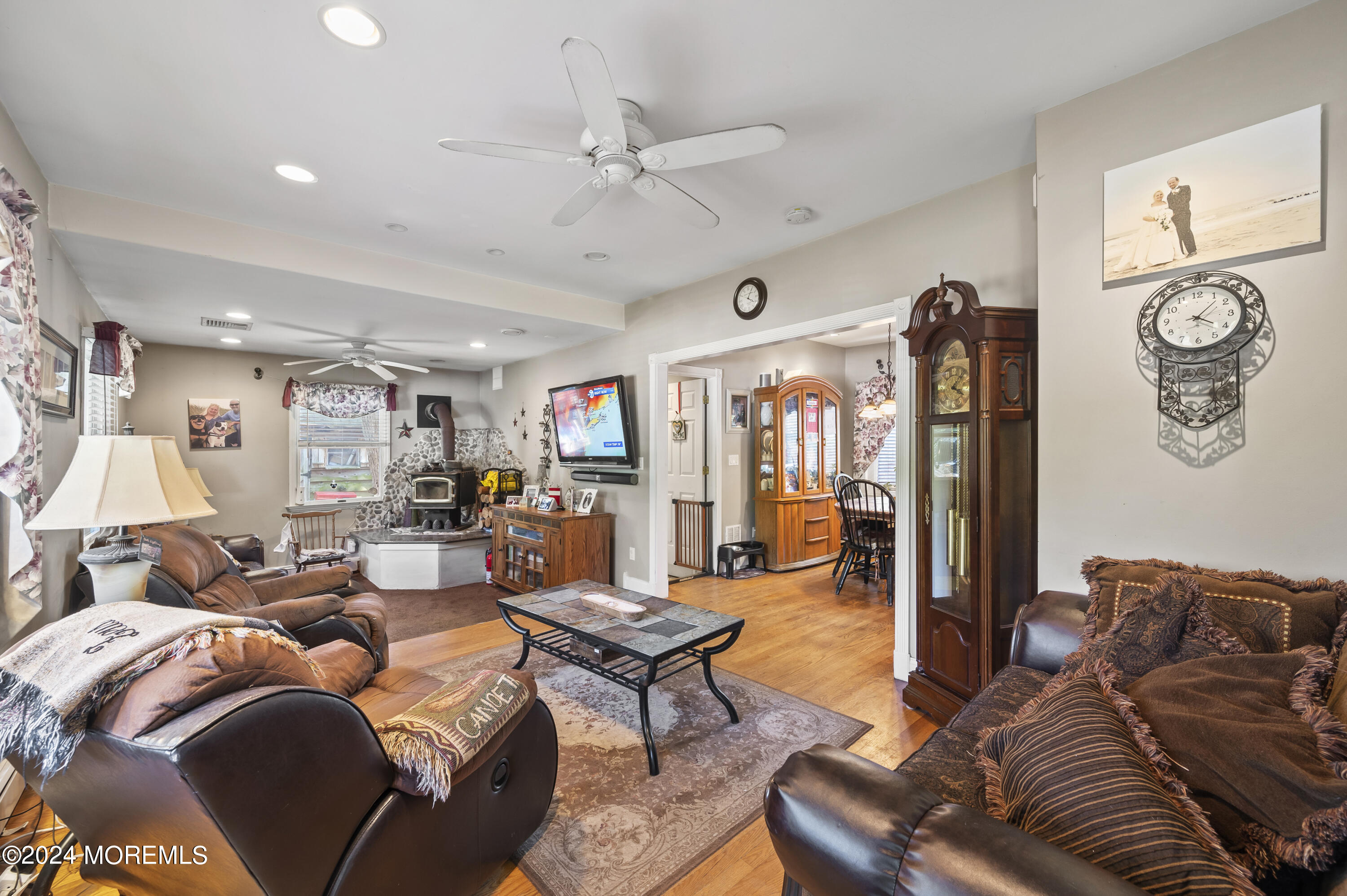 114 Andrew Lane Brick, NJ 08724 - Photo 34 of 54 a living room with furniture and a chandelier