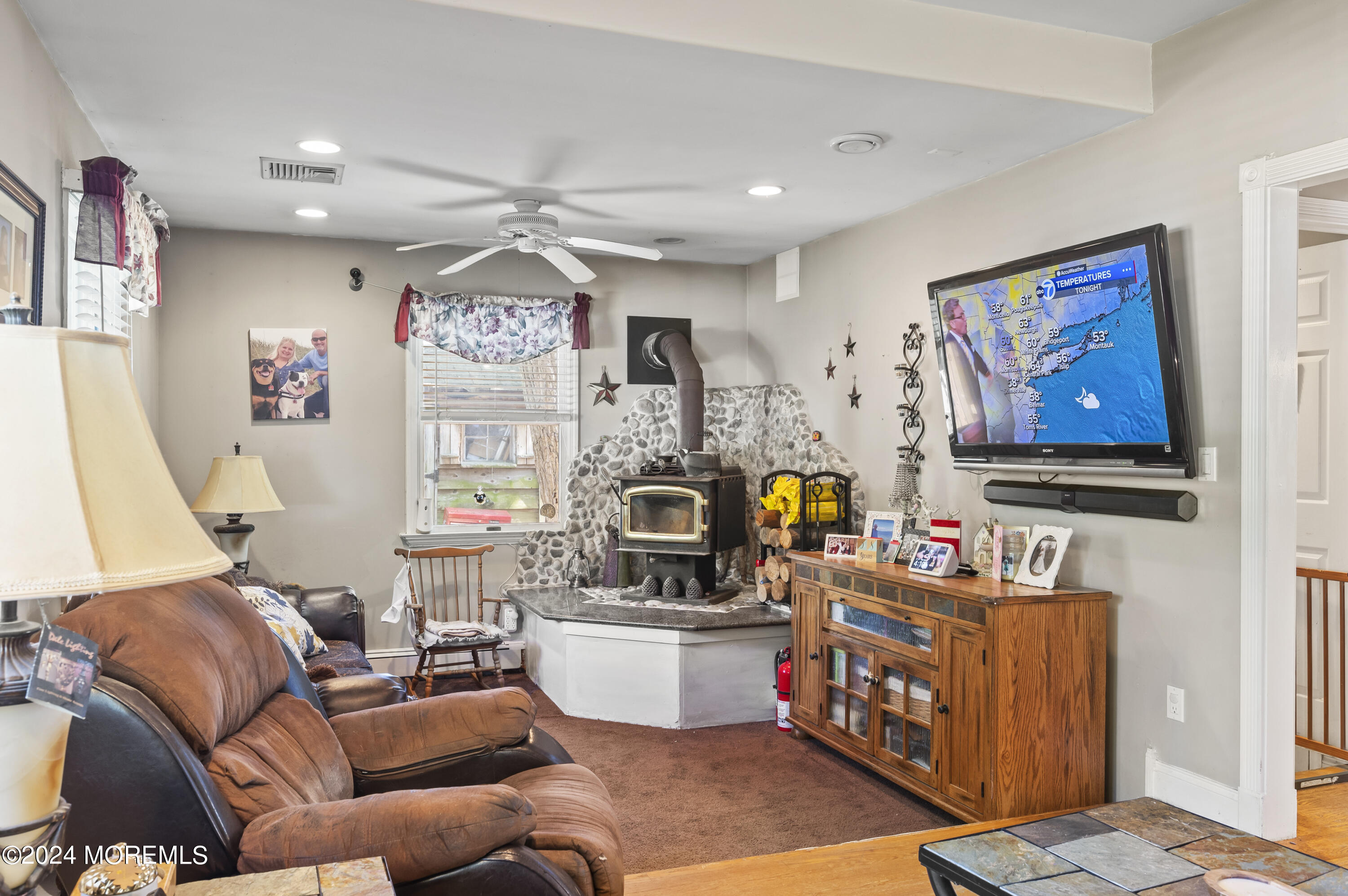 114 Andrew Lane Brick, NJ 08724 - Photo 35 of 54 a living room with furniture and a flat screen tv