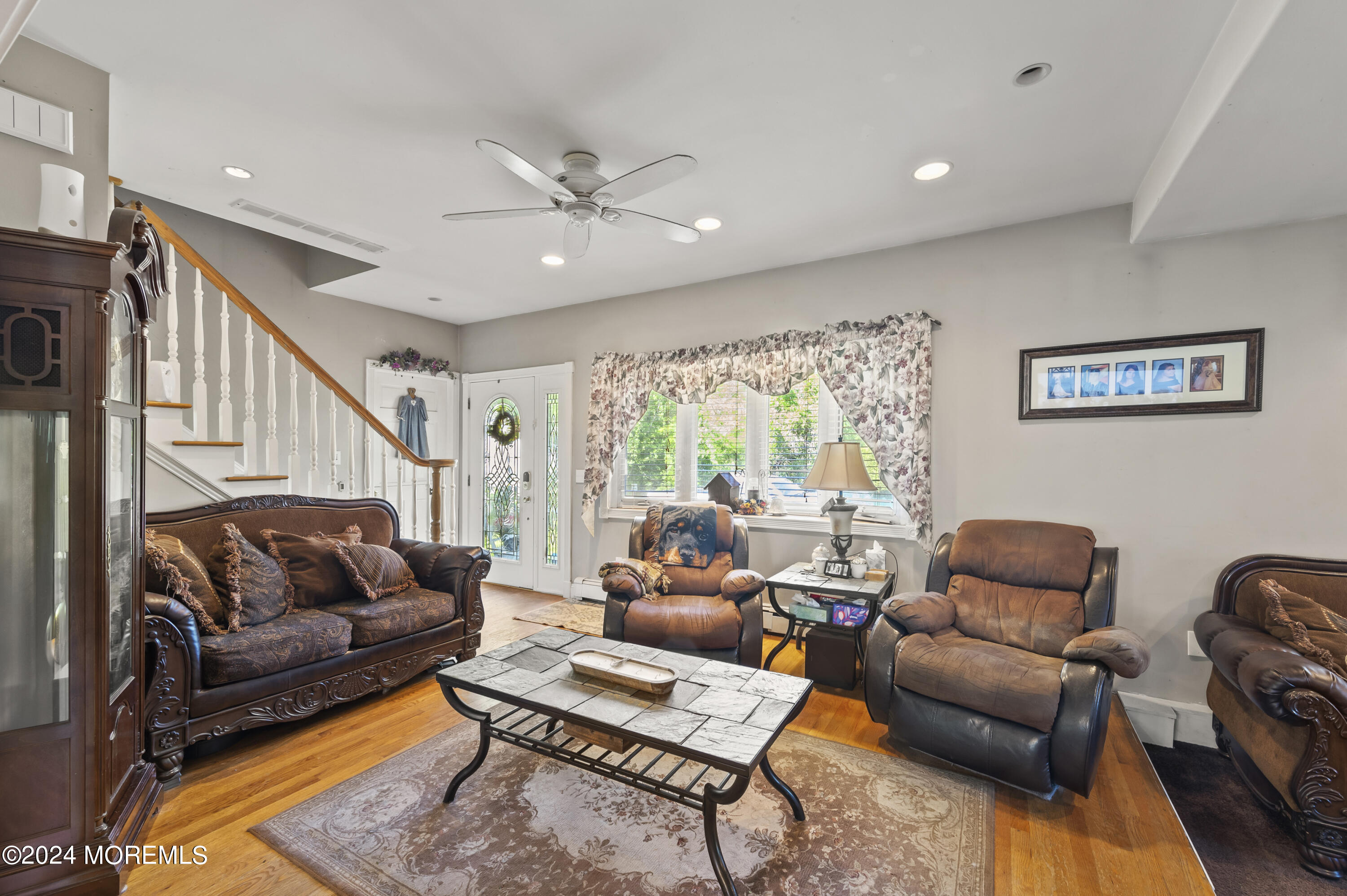 114 Andrew Lane Brick, NJ 08724 - Photo 39 of 54 a living room with furniture and a large window
