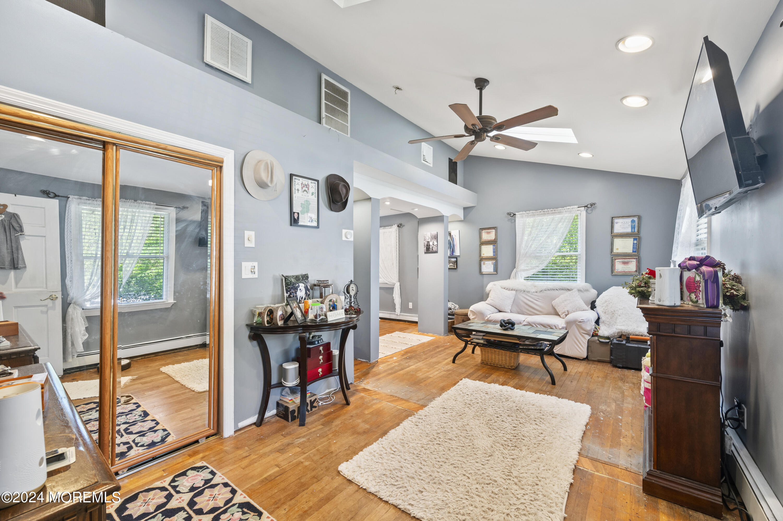 114 Andrew Lane Brick, NJ 08724 - Photo 41 of 54 a living room with furniture and wooden floor