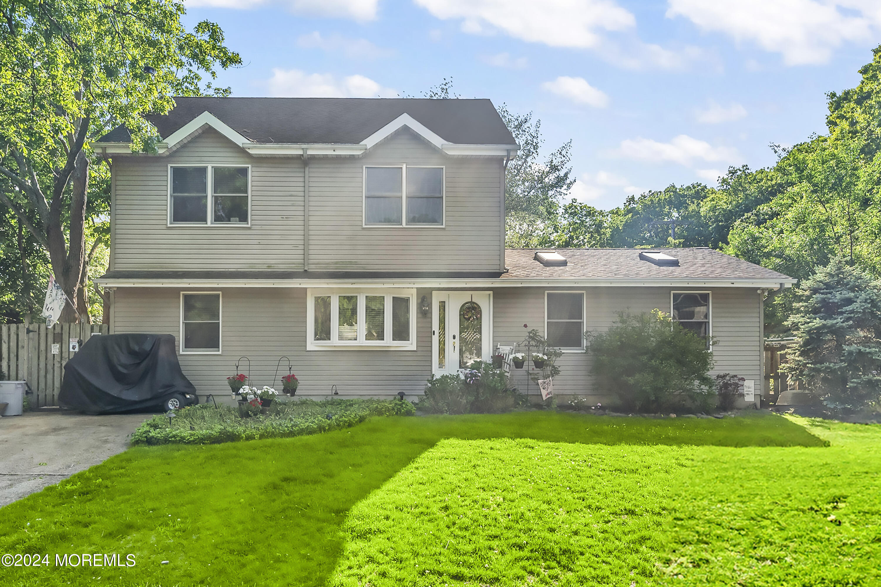 114 Andrew Lane Brick, NJ 08724 - Photo 52 of 54 a front view of a house with garden