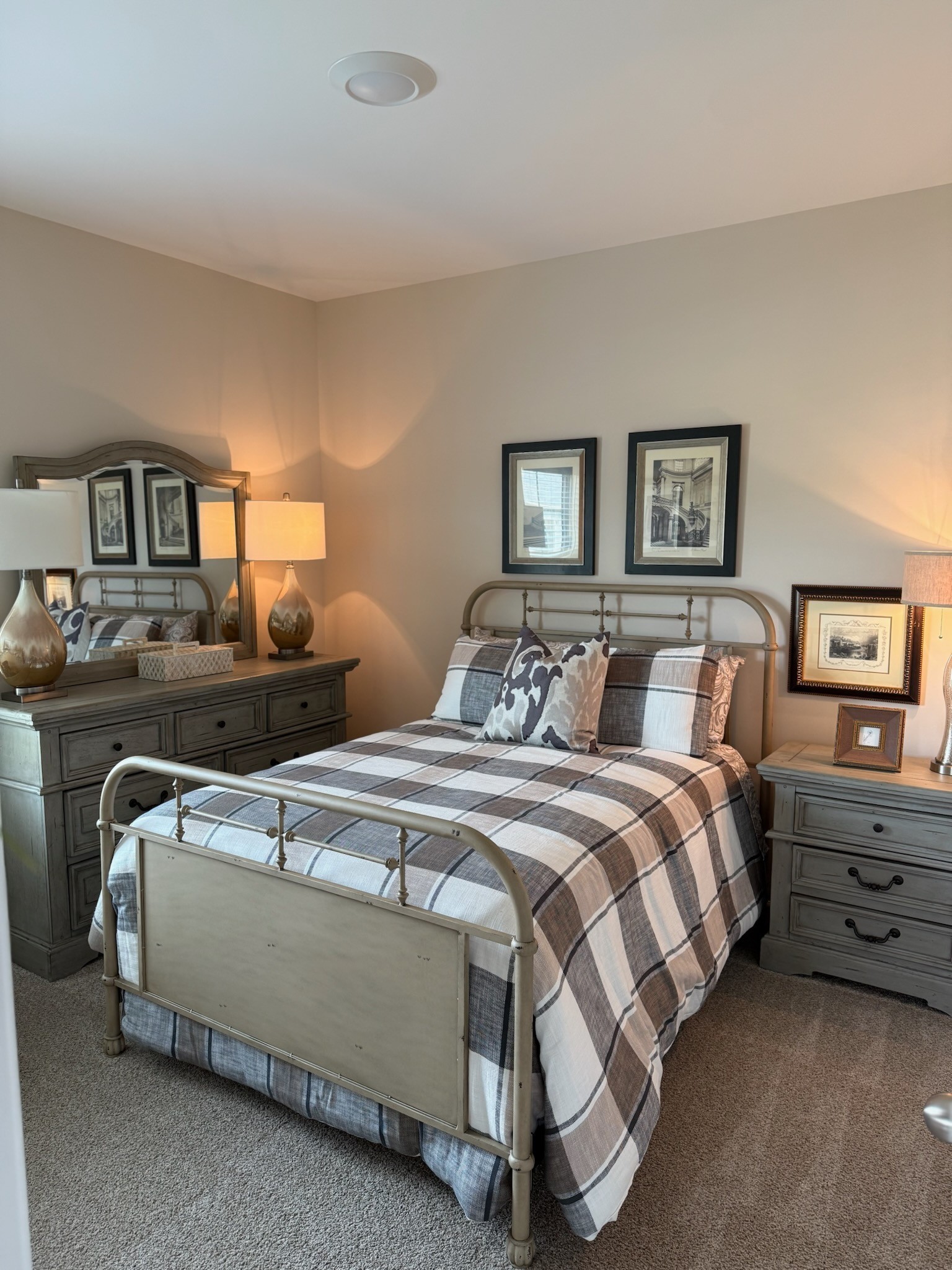 46 Stillwater Way Tullahoma, TN 37388 - Photo 8 of 9 a bedroom with a bed and a lamp on dresser