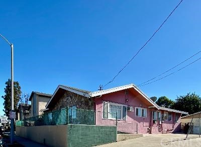 138 West 223rd Street Carson, CA 90745 - Photo 5 of 6 a front view of a house with garden